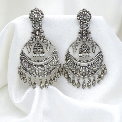 Oxidized silver floral chandbali drop earrings with traditional detailing by joyrias