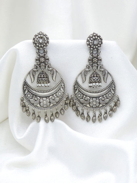 Oxidized silver floral chandbali drop earrings with traditional detailing by joyrias