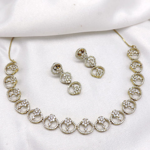 Pearl CZ AD necklace with matching earrings and gold-tone detailing by joyrias