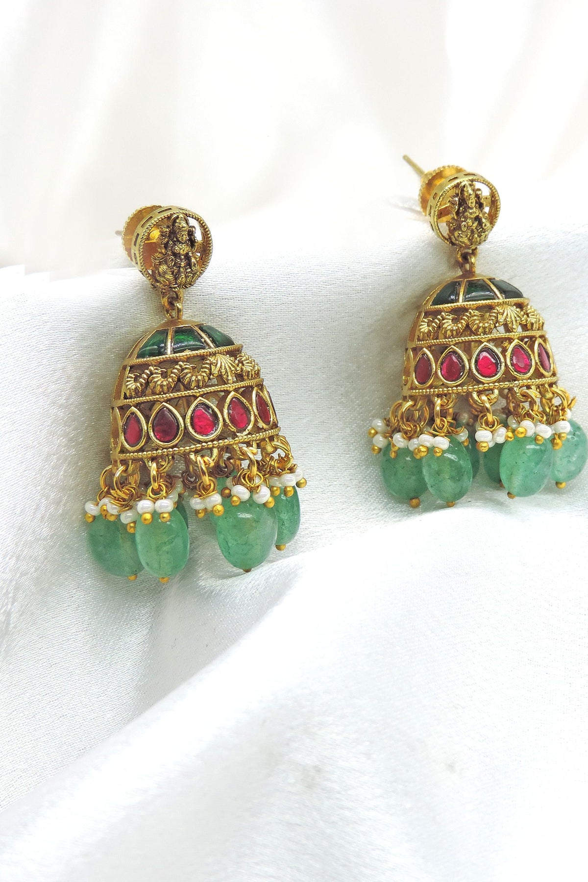 Emerald kundan jhumka earrings with pearl and bead drops by joyrias