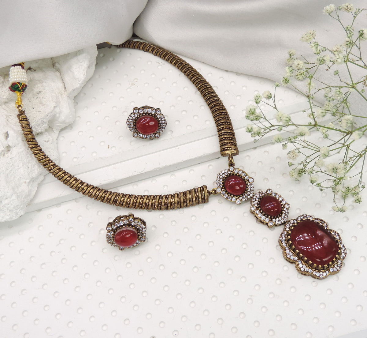 Antique finish coil choker necklace set with red cabochon pendant and matching earrings