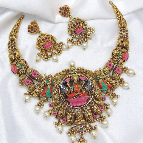 Antique gold-toned Lakshmi multicolor temple necklace set with pearl detailing and matching earrings by joyrias