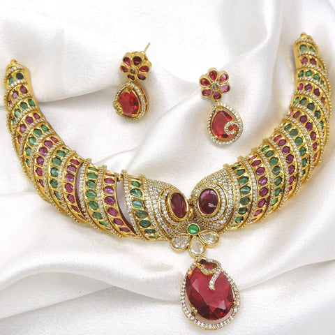 Ruby green necklace set with matching earrings by Joyrias
