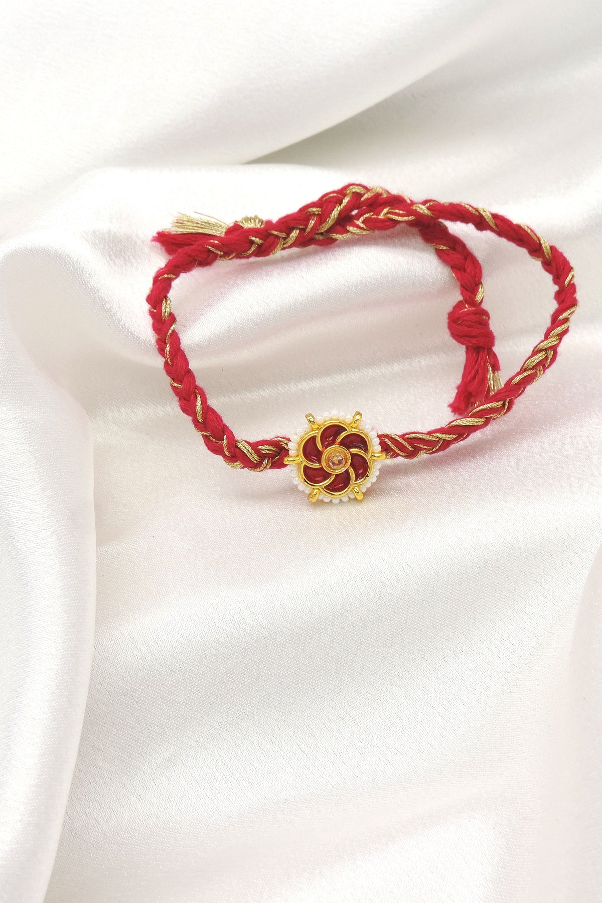 Red Floral Bhaiya Rakhi by Joyrias