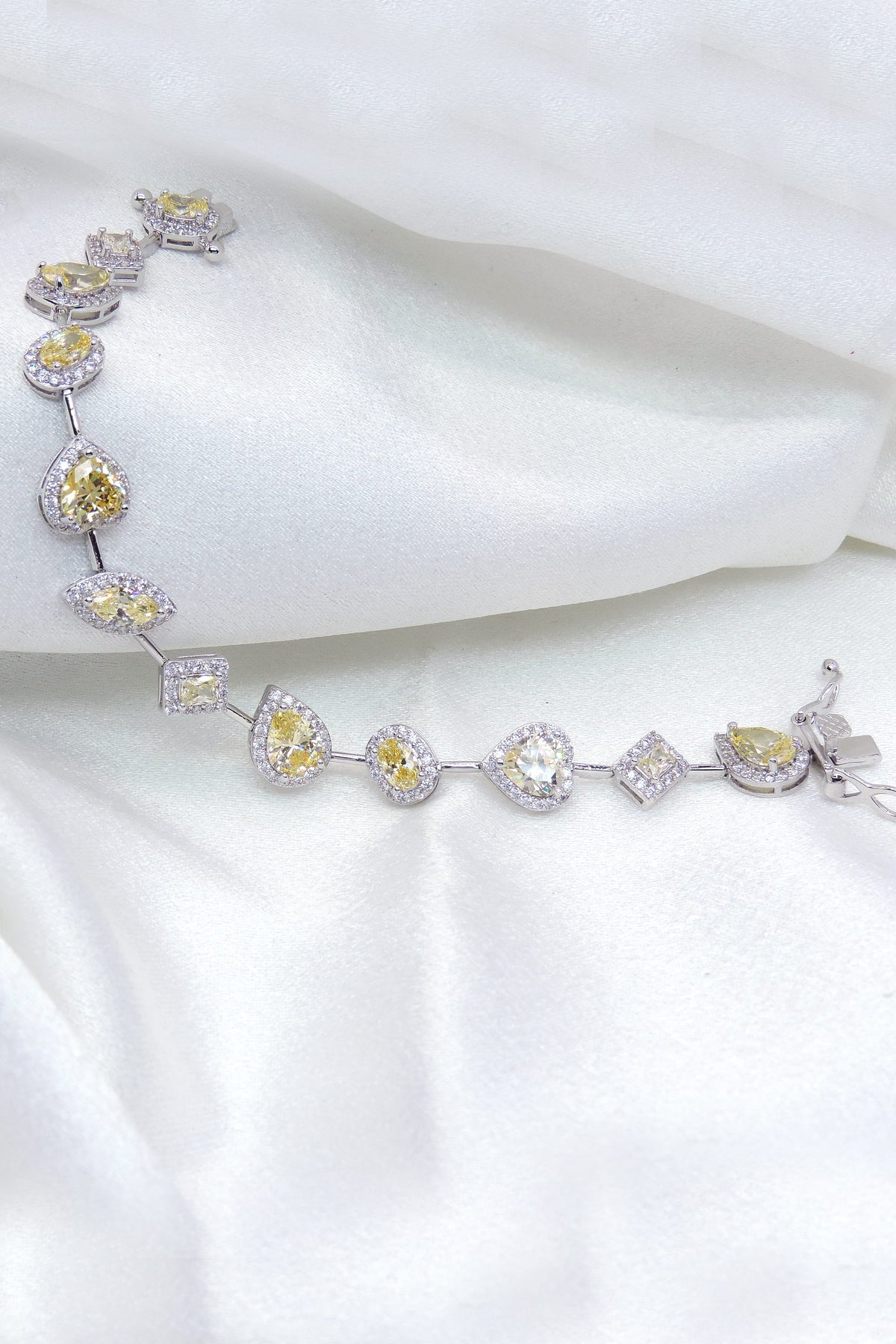 Yellow CZ multi shape tennis bracelet by Joyrias