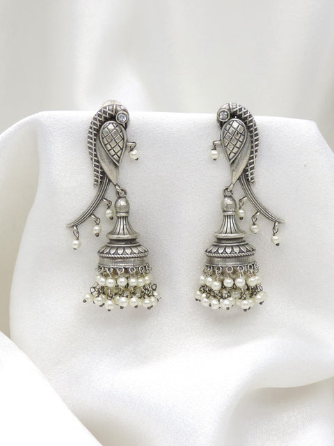 Oxidized silver peacock long jhumka earrings with pearl detailing by joyrias