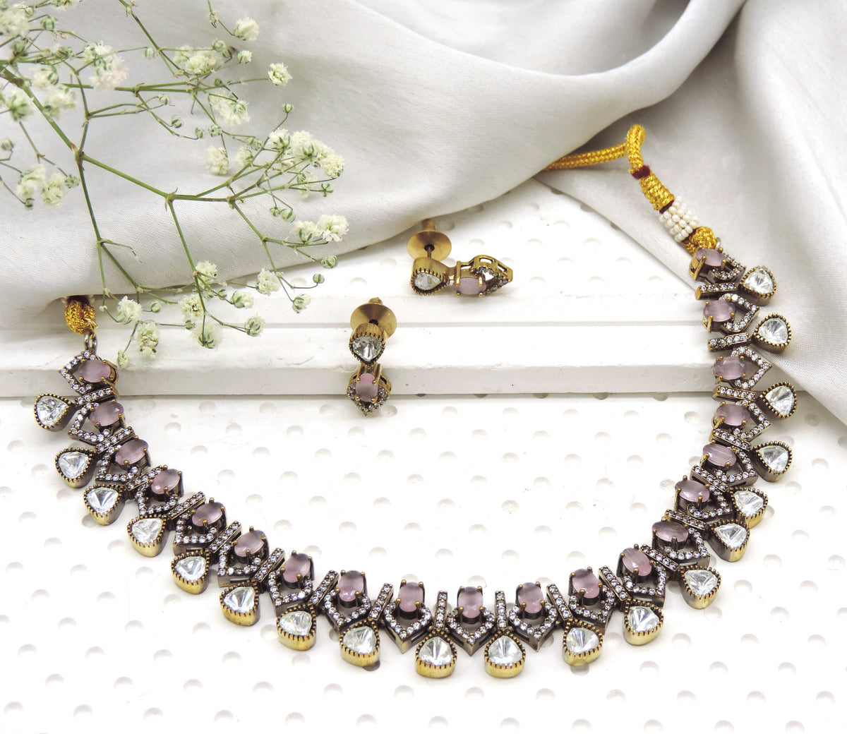 Mauve stone kundan inspired necklace set with crystal drop detailing and matching earrings