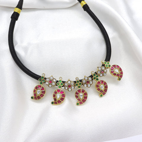 Classic kundan black thread necklace with ruby and green stones by joyrias