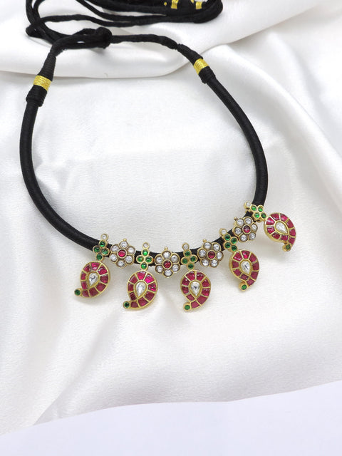 Classic kundan black thread necklace with ruby and green stones by joyrias