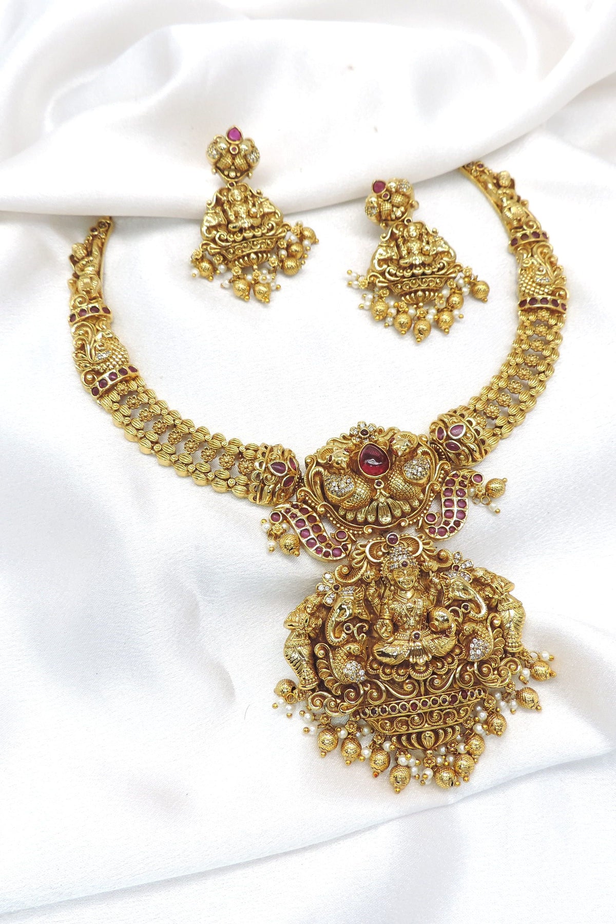 Majestic temple Lakshmi ruby necklace set by joyrias