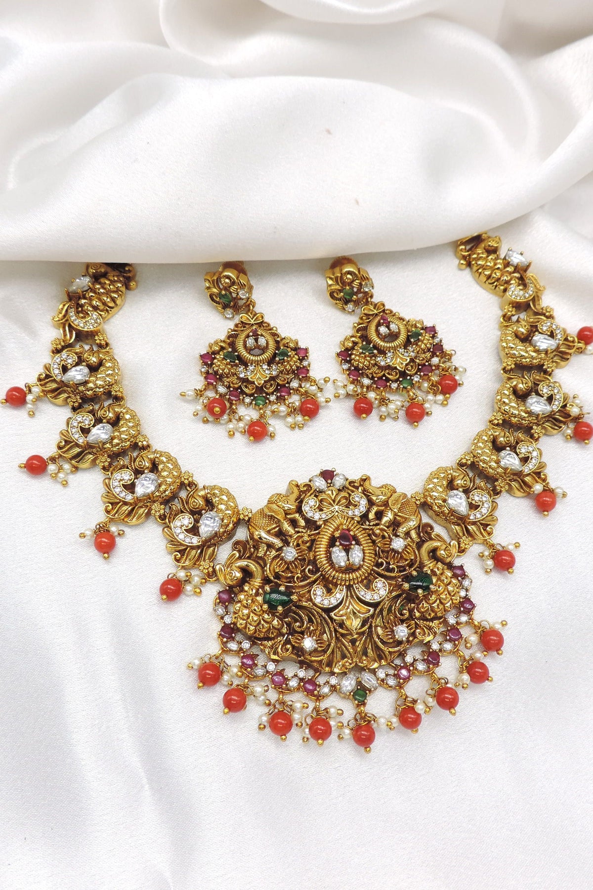 Opulent temple multicolor ruby pearl necklace set with matching earrings by joyrias