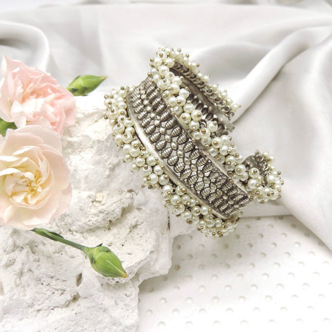 Oxidised wide cuff bracelet with pearl cluster border