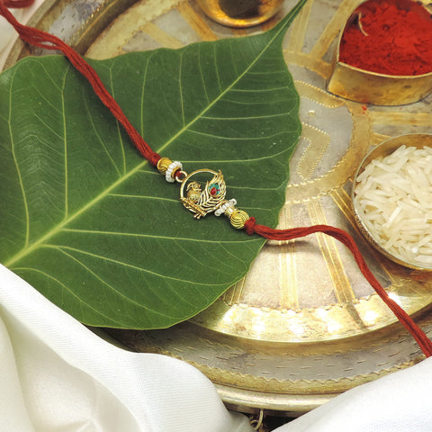 Elegant Peacock Rakhi with Pearl Accents | Handmade Raksha Bandhan Thread