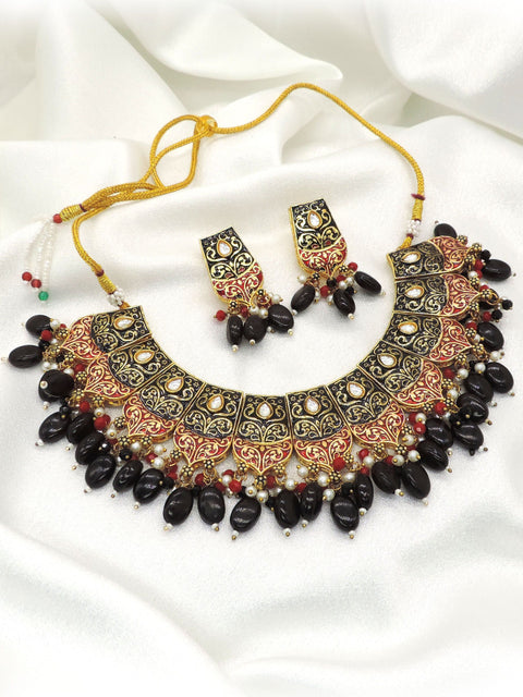 Black bead ethnic choker necklace set with intricate gold red detailing and matching earrings