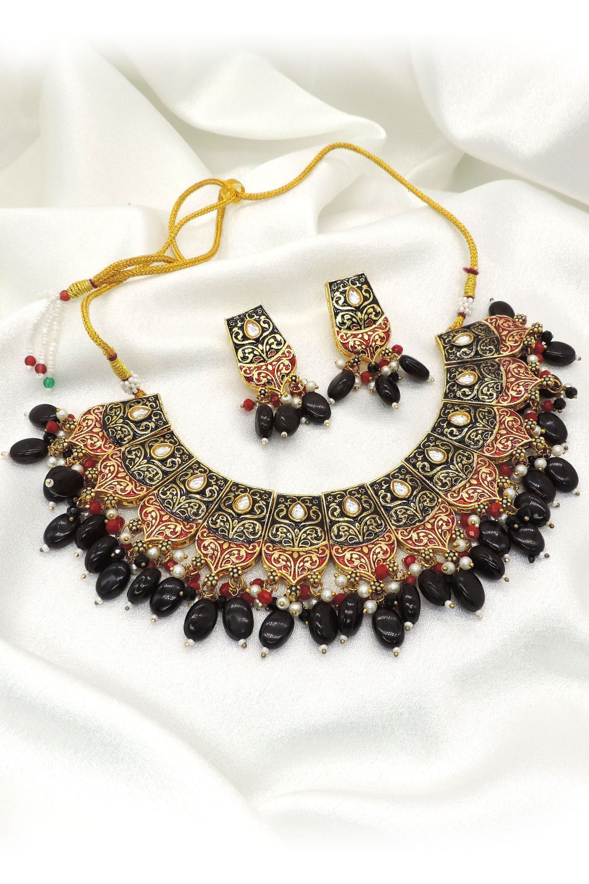 Black bead ethnic choker necklace set with intricate gold red detailing and matching earrings