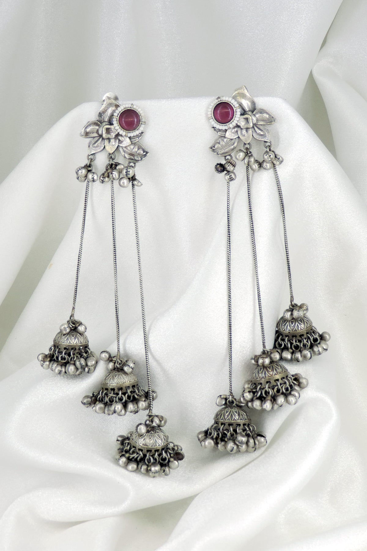 Oxidized silver Kashmiri long chain jhumka earrings with red stone floral detailing by joyrias