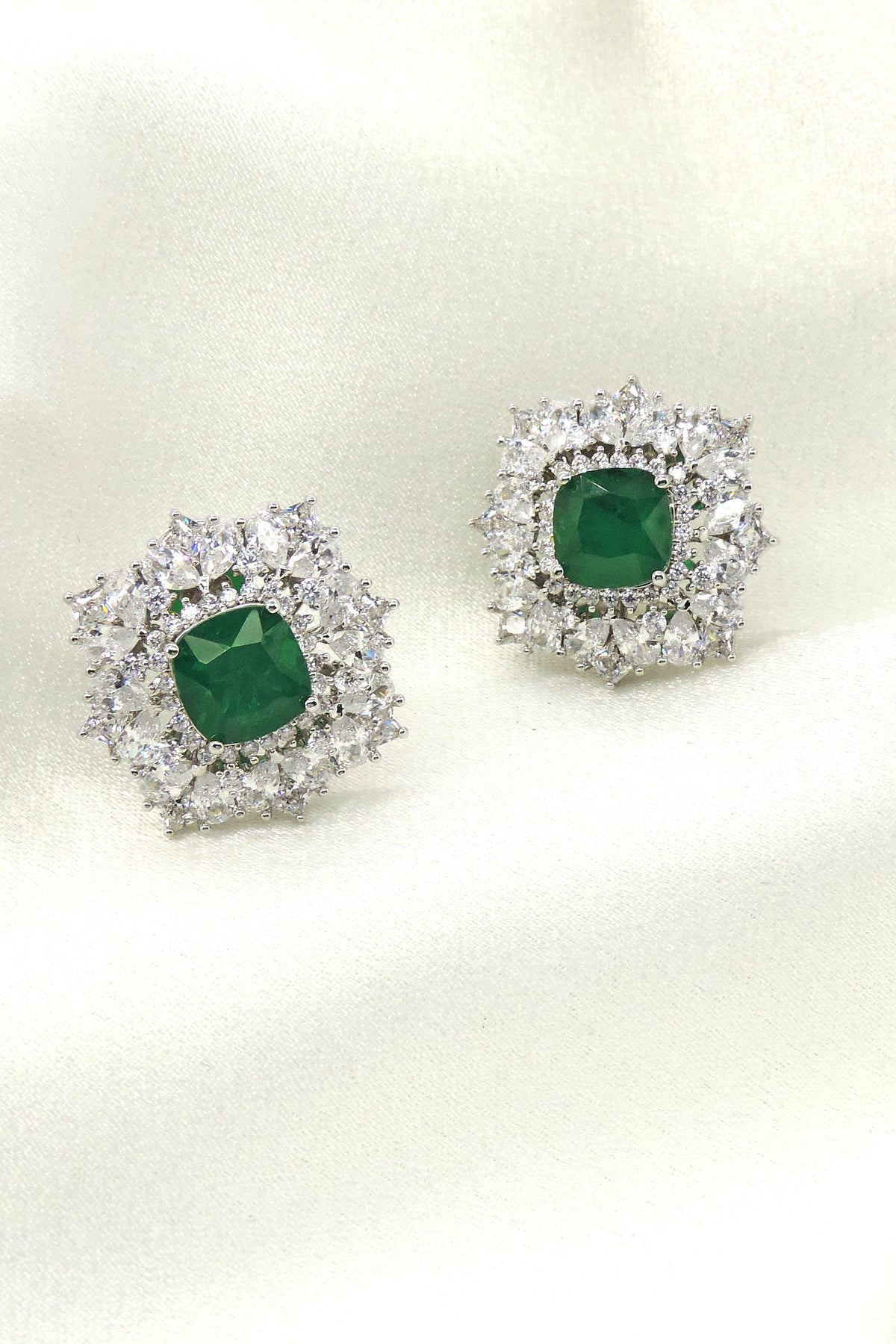 Emerald green AD cushion stud earrings by Joyrias