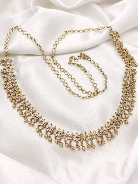 Antique kundan AD gold-toned waist chain with intricate detailing and hanging accents by joyrias