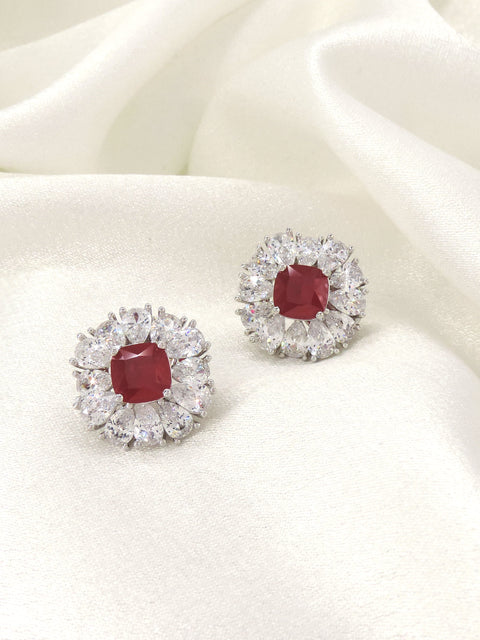 Ruby red cushion AD halo stud earrings by Joyrias