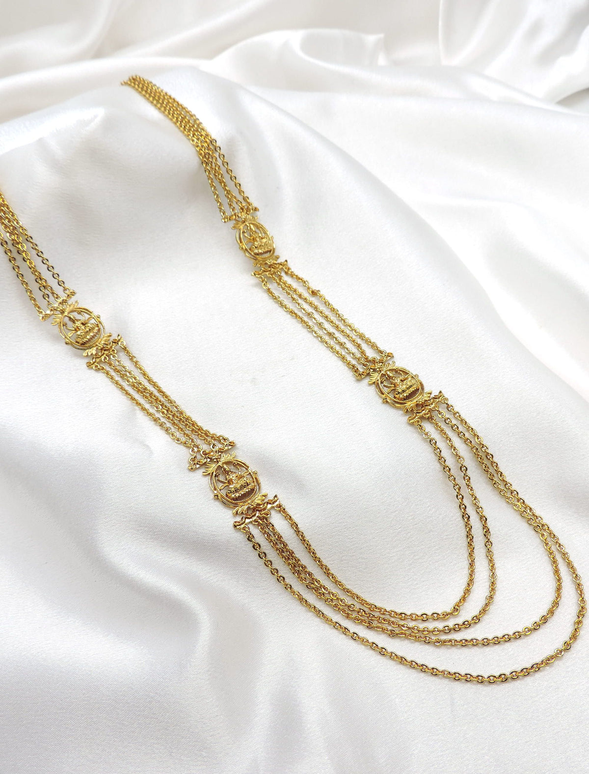Gold-toned temple multi-layer long necklace with traditional motifs by joyrias