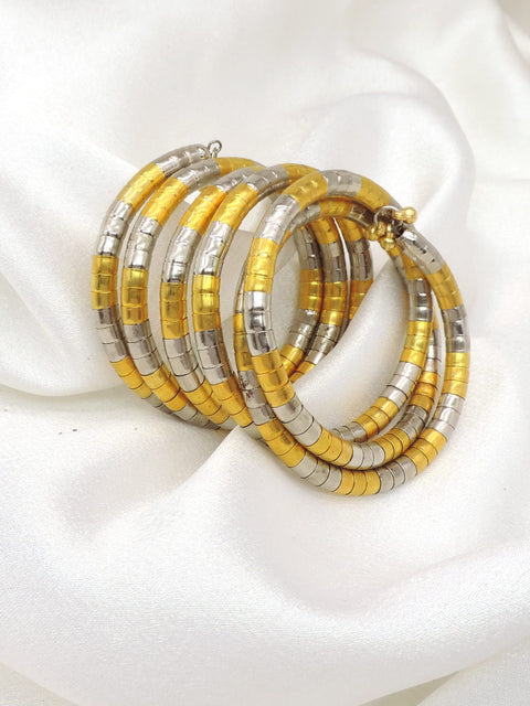 Dual-tone gold silver spiral hoop cuff bracelet with layered traditional detailing by joyrias