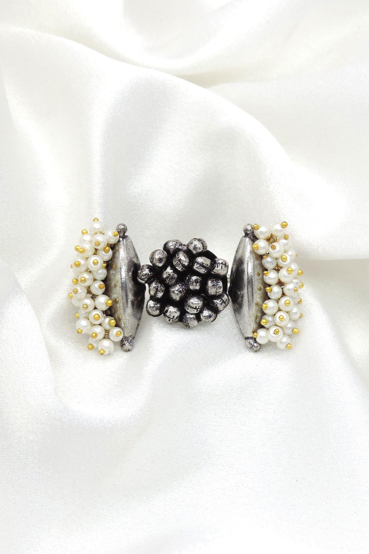Oxidized pearl black silver ring with textured detailing and beaded accents from joyrias