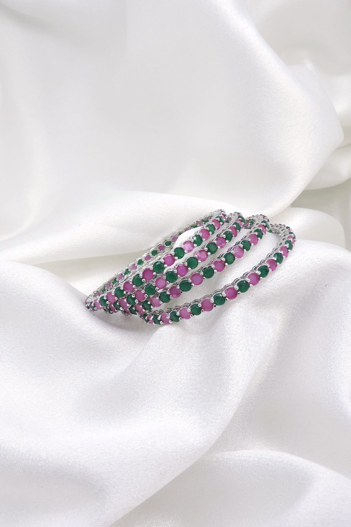 Ornate silver-toned pink green AD bangle set by joyrias