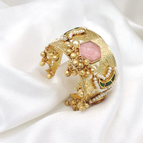Gold-toned multicolor floral pearl cuff bracelet with green pink stones and dangling charms by joyrias