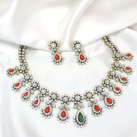 Red green floral AD necklace set with sparkling stones and matching earrings by joyrias