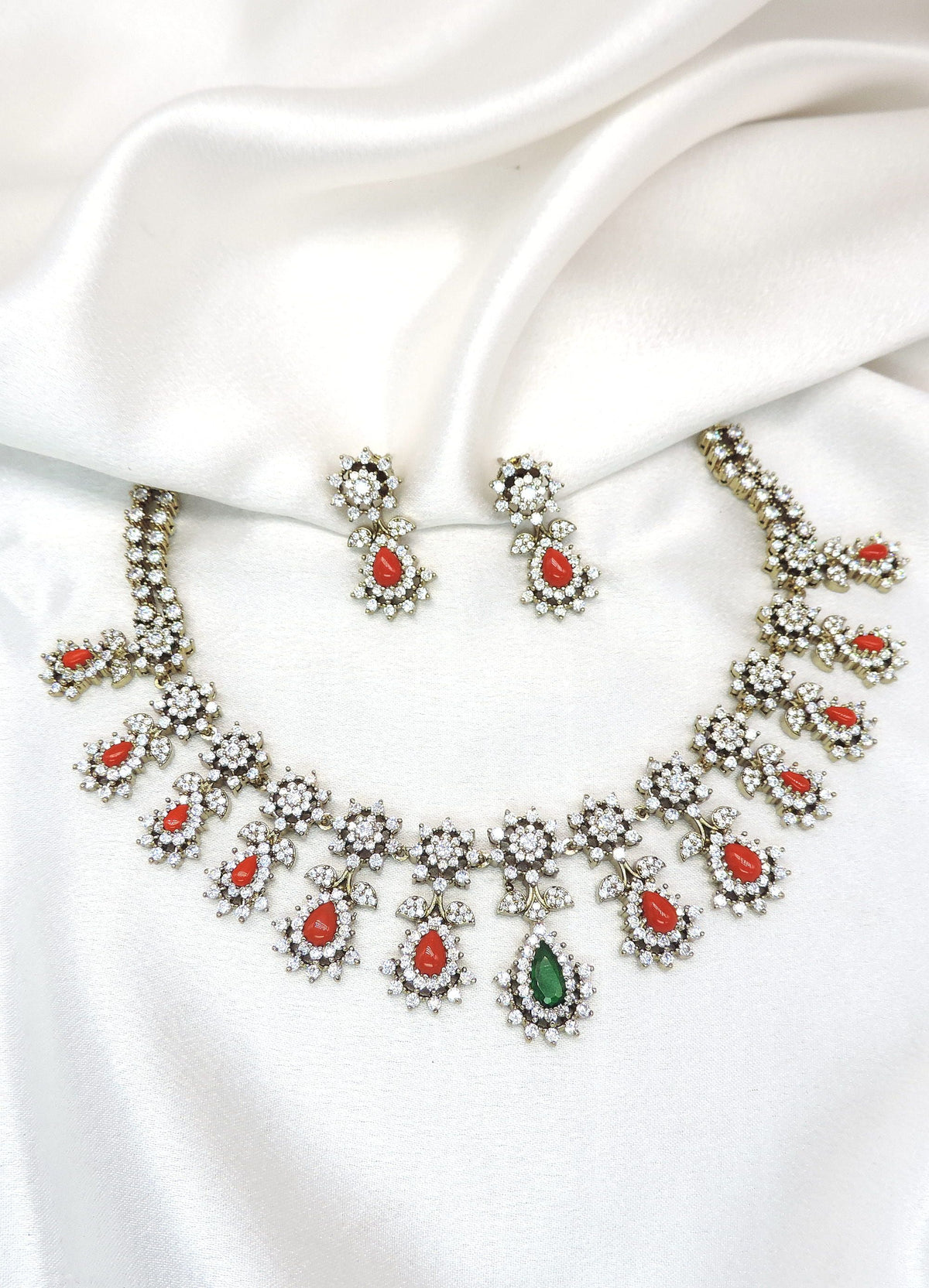 Red green floral AD necklace set with sparkling stones and matching earrings by joyrias