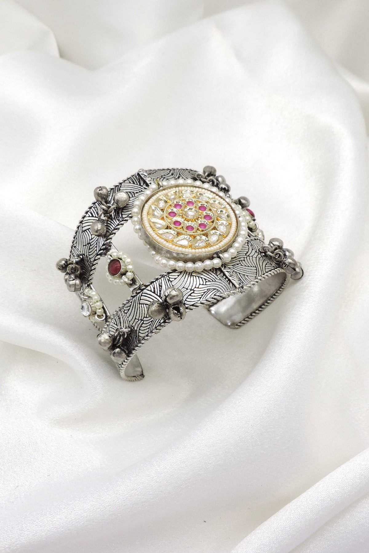 Oxidized dual-tone silver gold pink pearl cuff bracelet with ornate floral detailing by joyrias