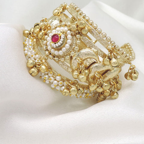 Gold-toned traditional temple elephant cuff bracelet with red stone and pearl detailing by joyrias