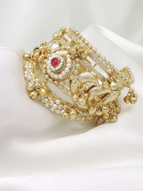Gold-toned traditional temple elephant cuff bracelet with red stone and pearl detailing by joyrias