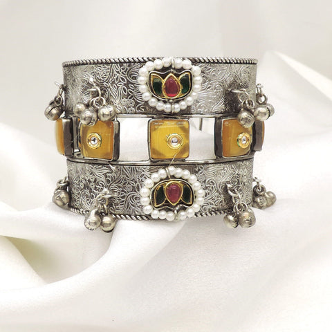 Oxidized silver multicolor floral cuff bracelet with maroon yellow stones and pearl detailing by joyrias