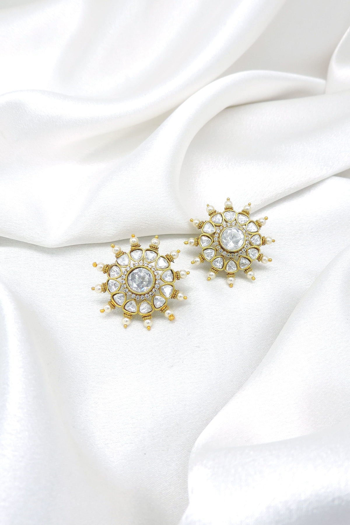 Ornate kundan polki floral pearl stud earrings by joyrias