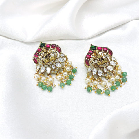 Exquisite temple ruby green pearl jhumka earrings by joyrias