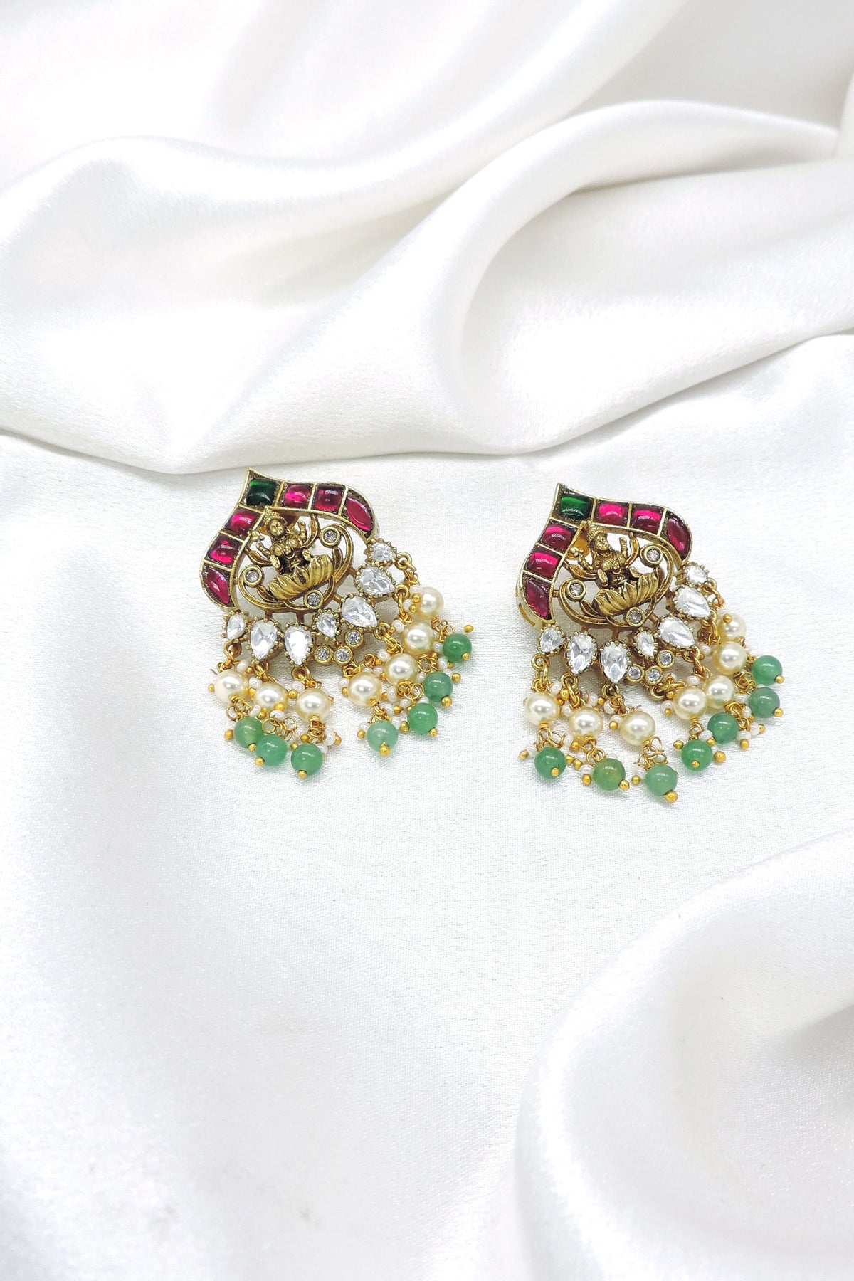 Exquisite temple ruby green pearl jhumka earrings by joyrias