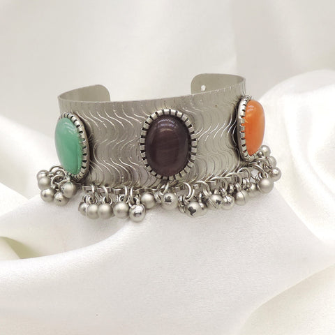 Oxidized silver multicolor stone cuff bracelet with green purple orange stones and dangling silver charms by joyrias