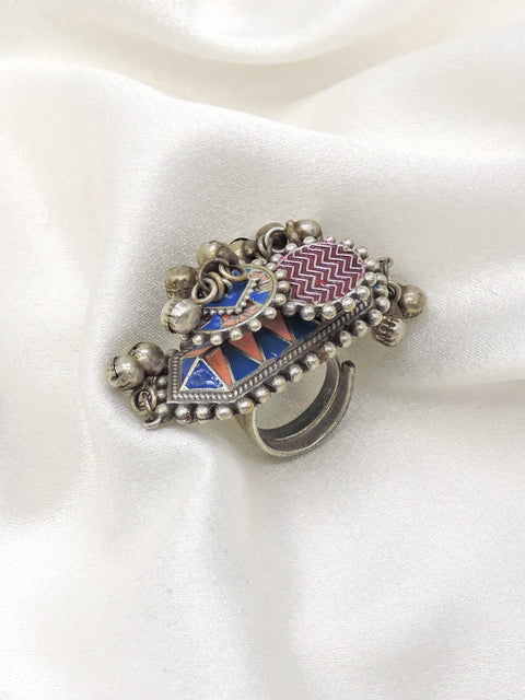 Oxidized multicolor enamel ring with blue and red geometric detailing from joyrias