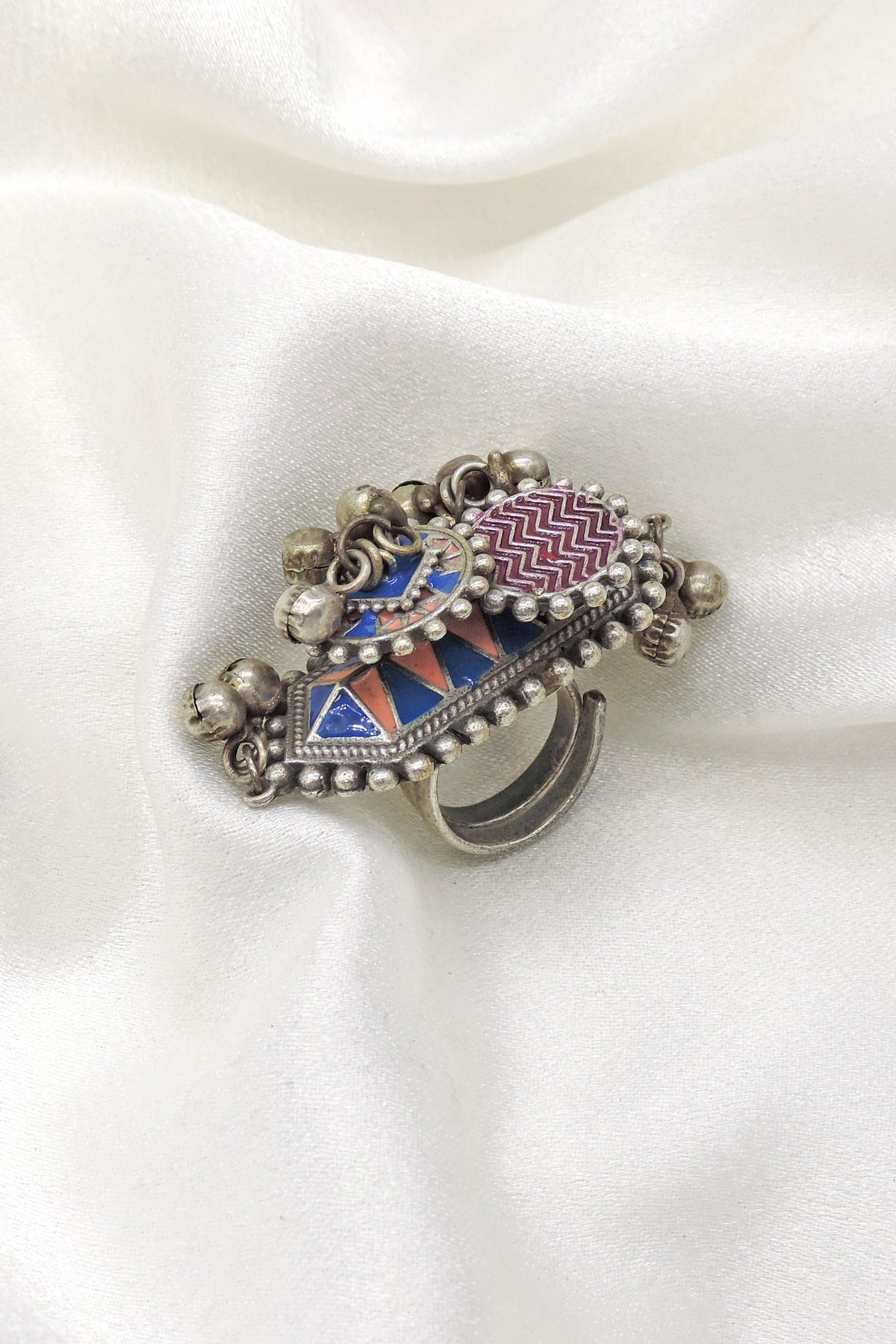 Oxidized multicolor enamel ring with blue and red geometric detailing from joyrias