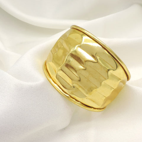 Polished gold wide cuff bracelet by Joyrias