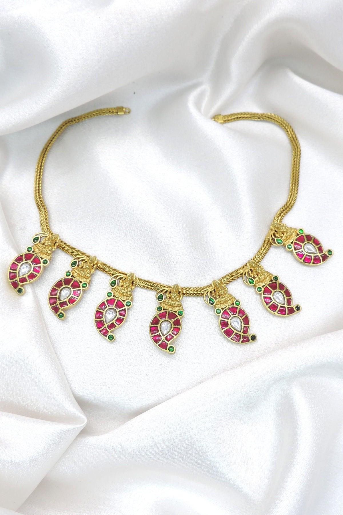 Traditional Manga Mala temple necklace with ruby and green stone paisley motifs by joyrias