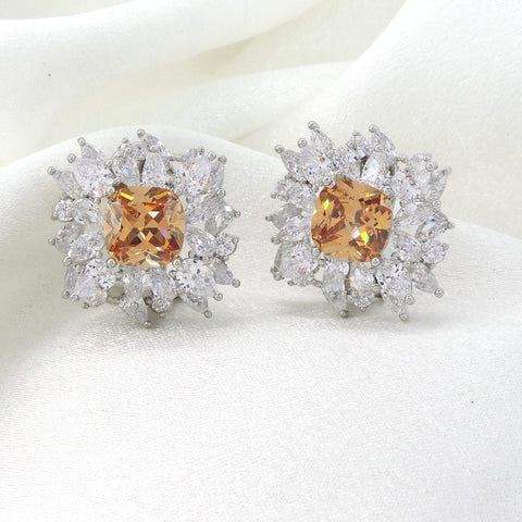 Champagne cushion AD CZ halo stud earrings by Joyrias