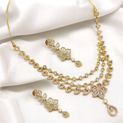 Traditional temple AD CZ cluster necklace set with layered floral design and matching earrings by joyrias
