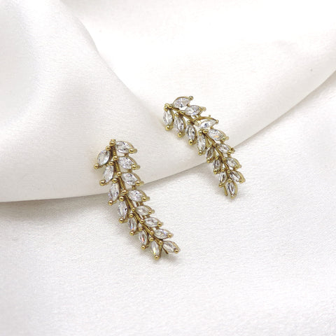 Gold-toned AD CZ leaf dangler earrings with cascading floral detailing by joyrias