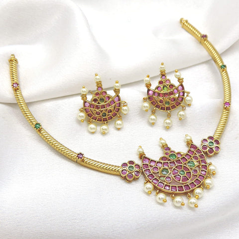 Traditional kundan chand pendant Hasli necklace set with pink and green stones and matching earrings by joyrias