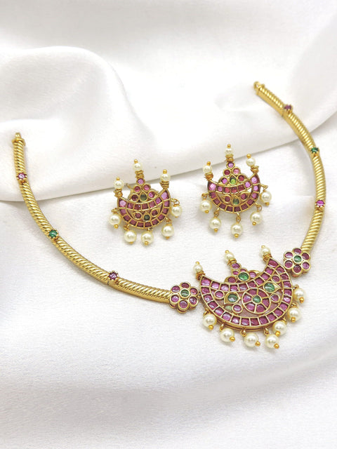 Traditional kundan chand pendant Hasli necklace set with pink and green stones and matching earrings by joyrias