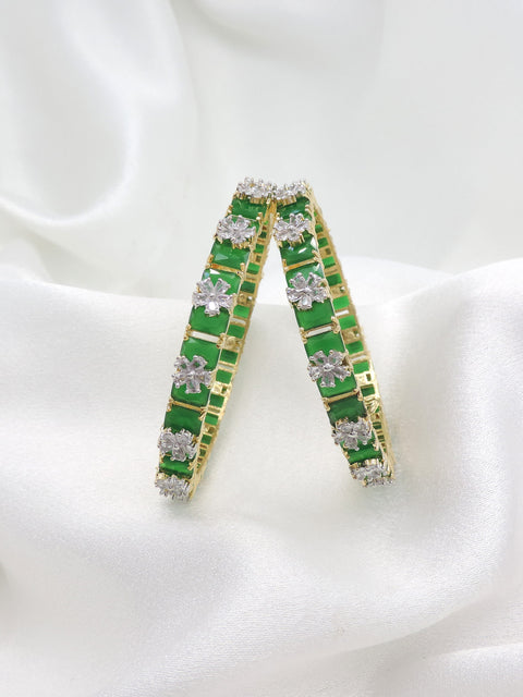 Graceful gold-toned green stone AD floral bangle set by joyrias