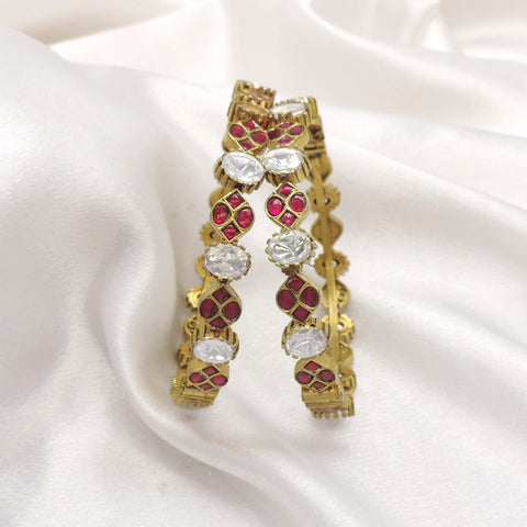 Gold plated ruby CZ AD bangle set with intricate detailing by joyrias