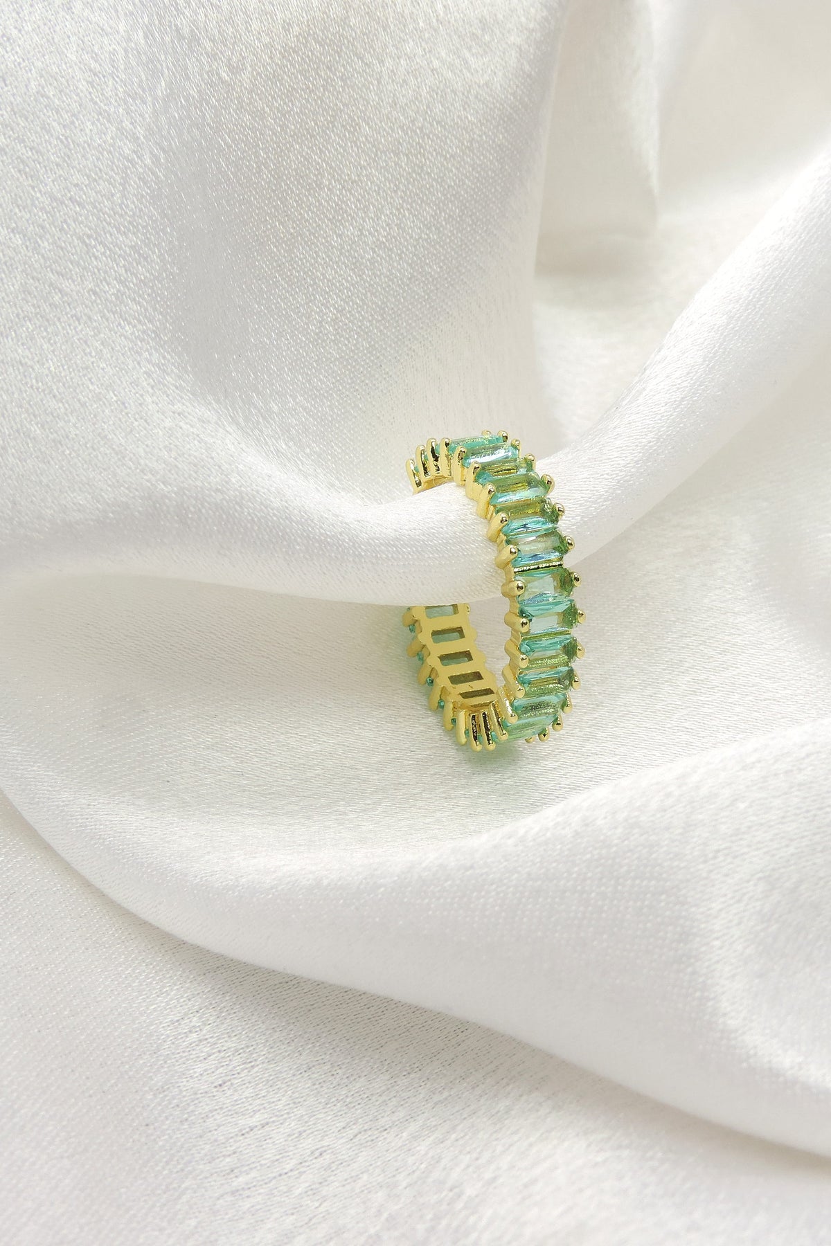 Gold Aqua Baguette Eternity Ring by Joyrias